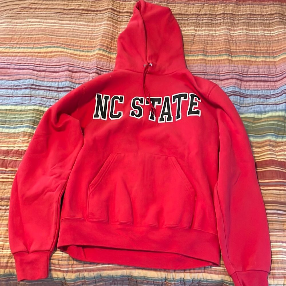 NC State champion sweatshirt with hood. Size medium.
